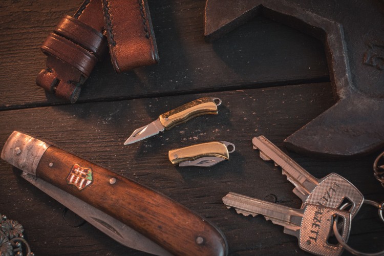Sharp Mini Folding Pocket Knife Keychain with Brass Finish & Steel Blade from STRAPSANDBRACELETS