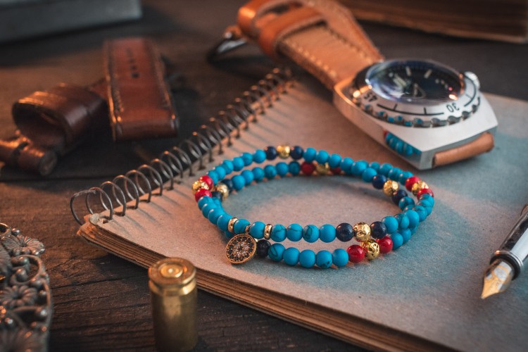 Tiago - 4mm - Matte Turquoise Beaded Stretchy Bracelet With Red, Blue & Golden Beads from STRAPSANDBRACELETS