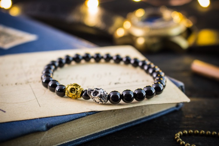 Dicaprio - 6mm - Black Onyx Beaded Stretchy Bracelet With Silver and Gold Skull Beads from STRAPSANDBRACELETS