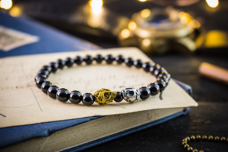 Dicaprio - 6mm - Black Onyx Beaded Stretchy Bracelet With Silver and Gold Skull Beads from STRAPSANDBRACELETS