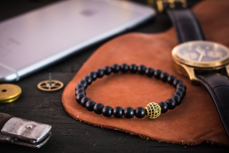 Duncan - 6mm - Matte Black Onyx Beaded Stretchy Bracelet with Gold Micro Pave Ball Charm from STRAPSANDBRACELETS