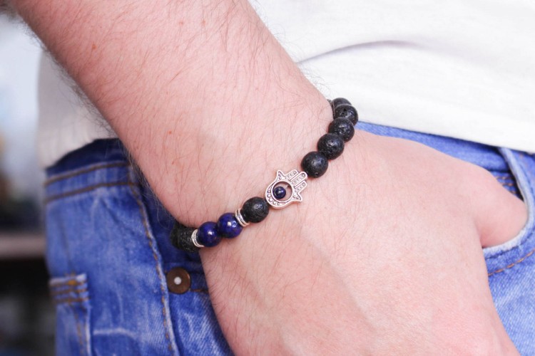 Regann - 8mm - Black Lava Stone And Blue Lapis Lazuli Beaded Stretchy Bracelet with Silver Hamsa Hand from STRAPSANDBRACELETS