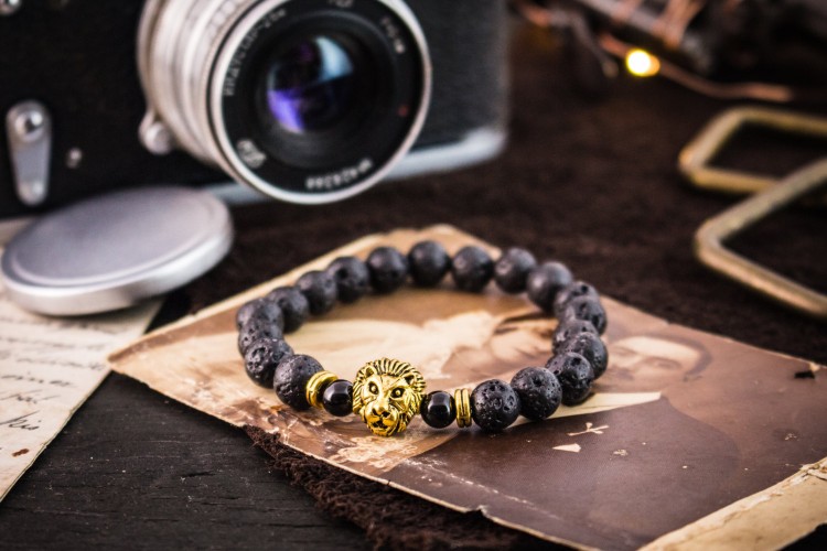 Louden - 8mm - Black Lava Stone Beaded Stretchy Bracelet with Gold Lion from STRAPSANDBRACELETS