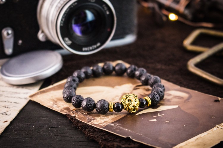 Louden - 8mm - Black Lava Stone Beaded Stretchy Bracelet with Gold Lion from STRAPSANDBRACELETS