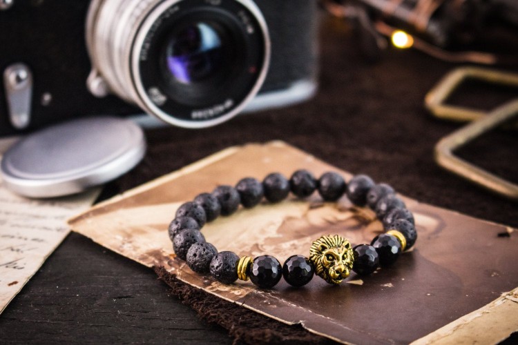 Rafe - 8mm - Black Lava Stone Beaded Gold Lion Stretchy Bracelet with Faceted Beads from STRAPSANDBRACELETS