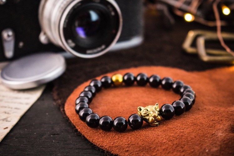 Cosmo - 8mm - Black Onyx Beaded Stretchy Bracelet with Gold Leopard Head from STRAPSANDBRACELETS