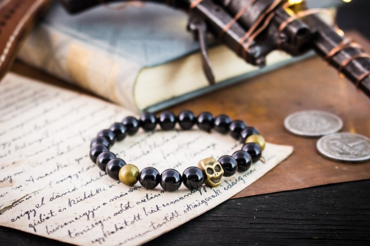 Cuillan - 8mm - Black Onyx Beaded Stretchy Bracelet with Bronze Skull and Bronze Beads from STRAPSANDBRACELETS