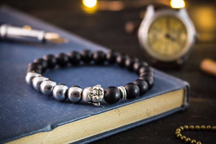 Dyllon - 8mm - Matte black beaded stretchy bracelet with silver laughing Buddha & silver plated hematite from STRAPSANDBRACELETS