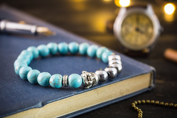 Cayrn - 8mm - Turquoise  And Silver Plated Hematite Beaded Stretchy Bracelet With Silver Laughing Buddha from STRAPSANDBRACELETS