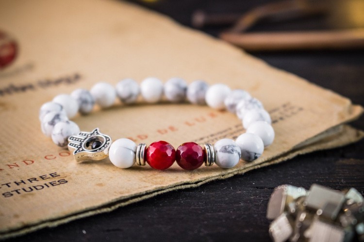 Moncef - 8mm - White Howlite And Faceted Red Imitation Coral Beaded Stretchy Bracelet with Silver Hamsa Hand from STRAPSANDBRACELETS