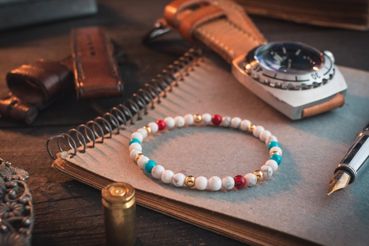 Advith - 4mm - White Howlite Beaded Stretchy Bracelet With Turquoise & Golden Beads from STRAPSANDBRACELETS
