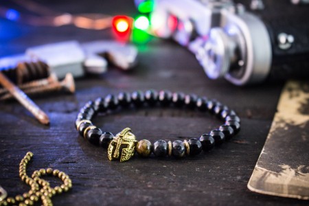 Rayan - 6mm - Black Onyx & Picasso Stone Beaded Stretchy Bracelet with Gold Spartan Helmet