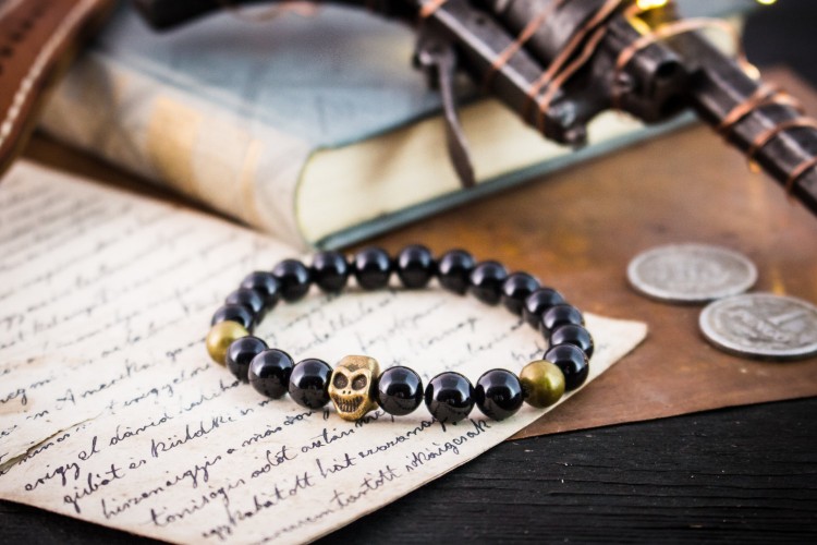 Cuillan - 8mm - Black Onyx Beaded Stretchy Bracelet with Bronze Skull and Bronze Beads from STRAPSANDBRACELETS