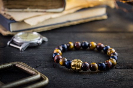 Rishi - 8mm - Blue, Red and Brown Tiger Eye Beaded Stretchy Bracelet with Gold Grenade Bead